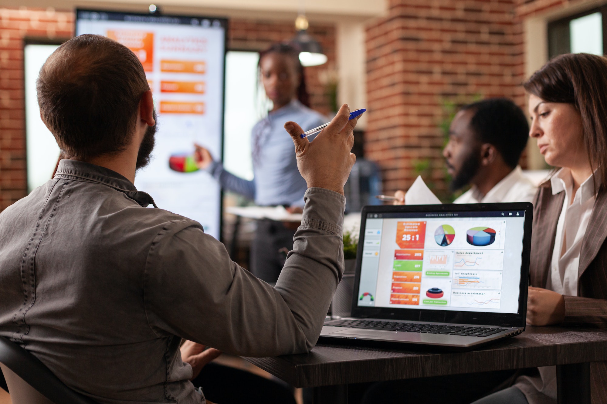 entrepreneur-man-explaining-company-strategy-looking-financial-graph.jpg